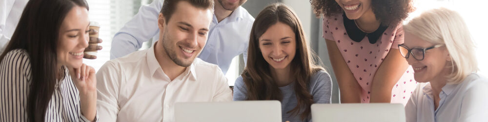 group of people learning at computers